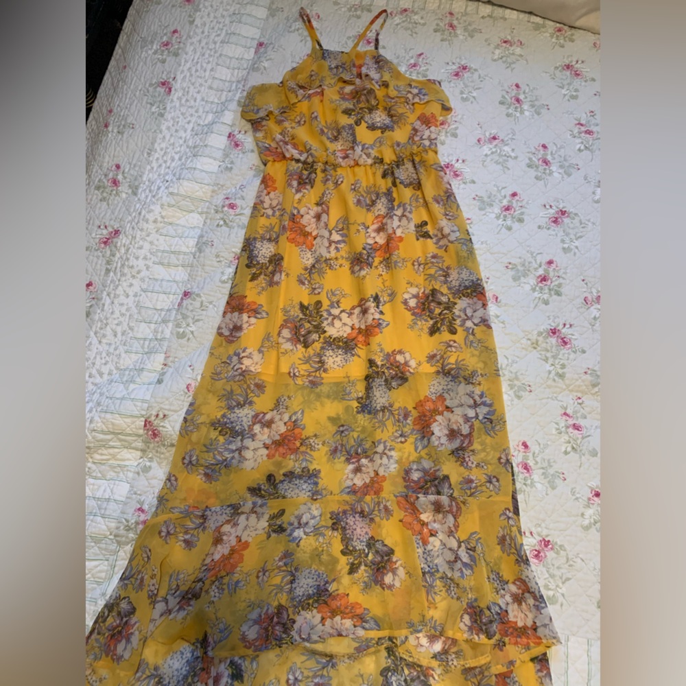 Yellow floral high low ruffle dress.